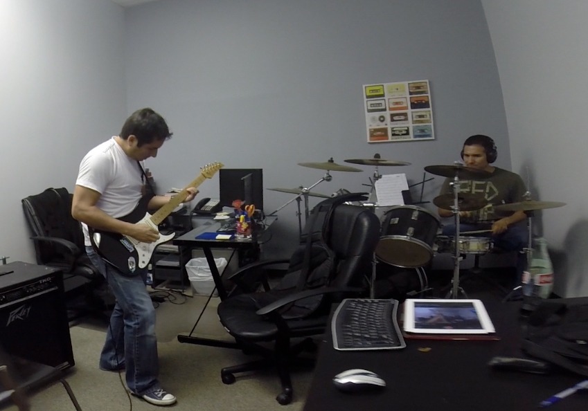Manuel on drums and Javier on guitar, jamming at the VND office, 2014