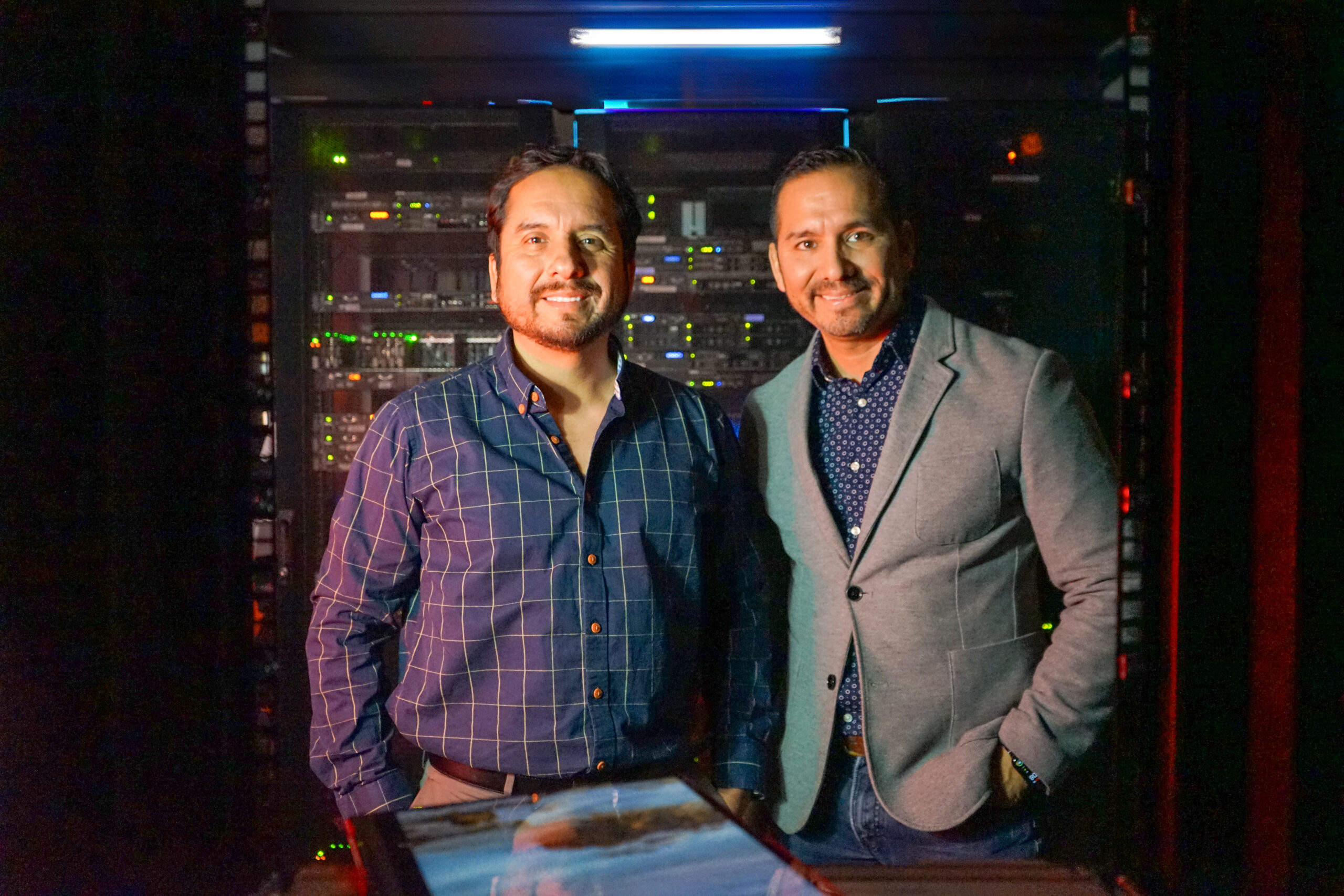 Manuel and Javier Oblitas, VND founders, at VND's data center